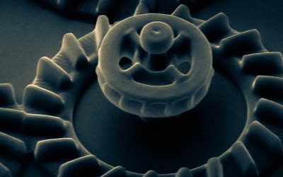 Light controlled 3D micromotors powered by bacteria